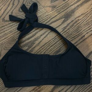 Black halter bikini top with buttons down the front in size M